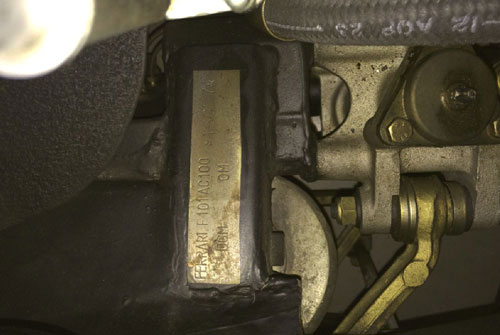 The serial number is stamped into the frame near the right front suspension (s/n 16057).